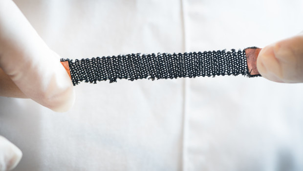 Knitting and weaving artificial muscles